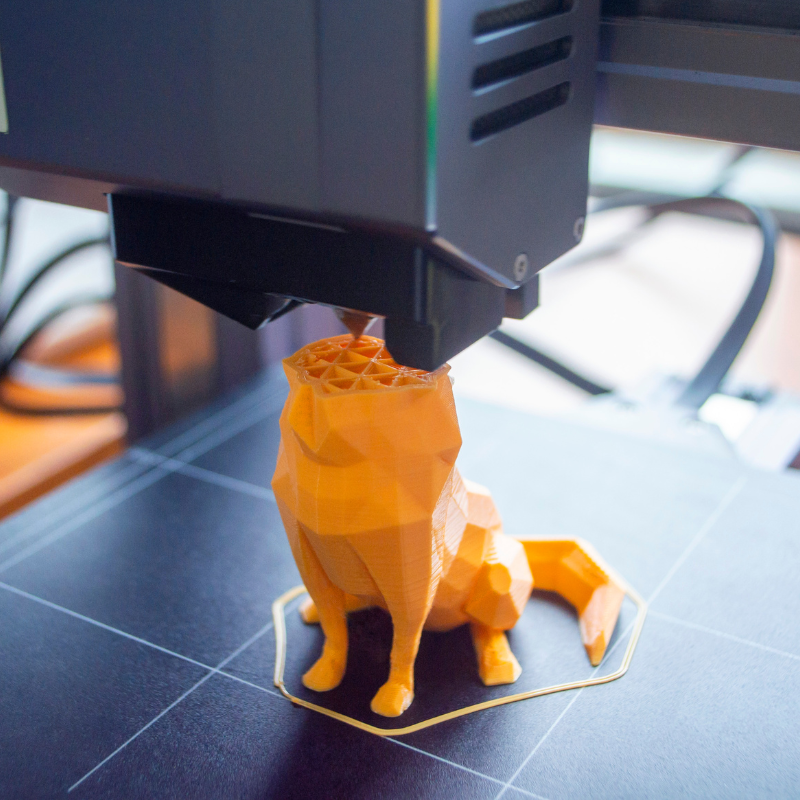 3D Printer creating a dog