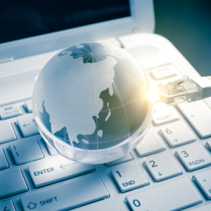 globe on top of computer keyboard