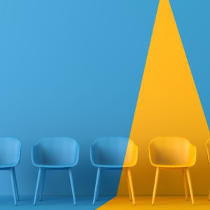 row of chairs bathed in blue and yellow light